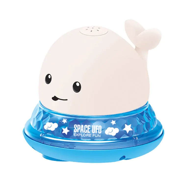 Grey and white cartoon whale bath toy spraying water with LED lights glowing