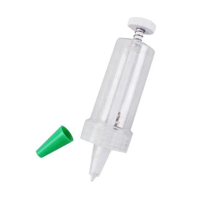 Plastic mini garden seeder tool measuring 12cm long for precise seed planting in pots