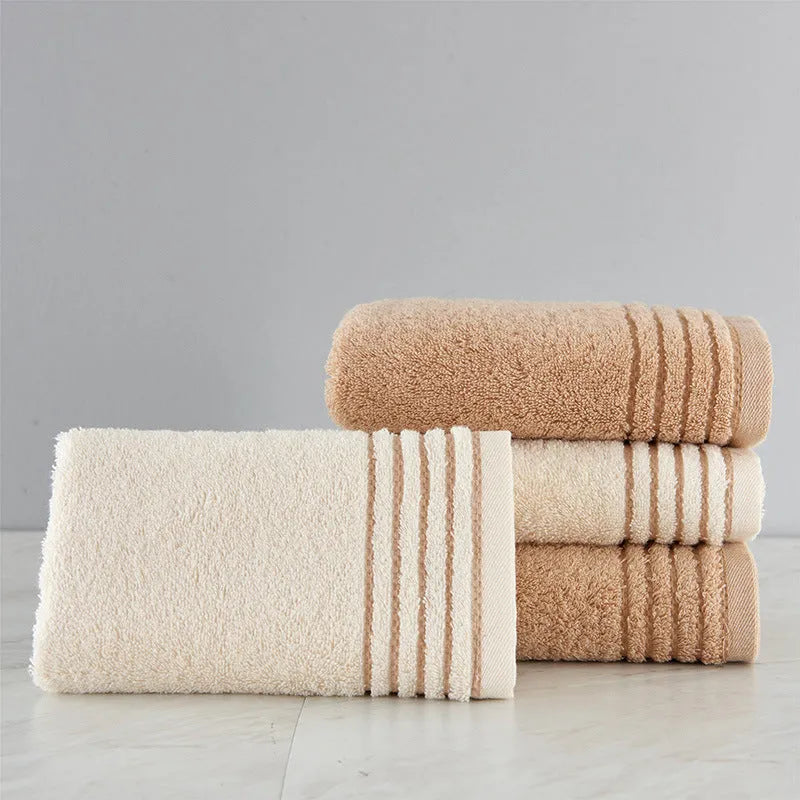 Cotton towels set showing bath, hand and guest towels in brown colour