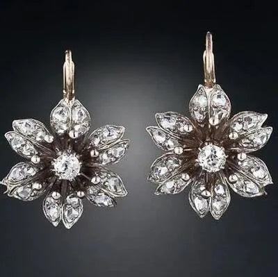 Silver retro fashion earrings with electroplated alloy construction and creative OL style design