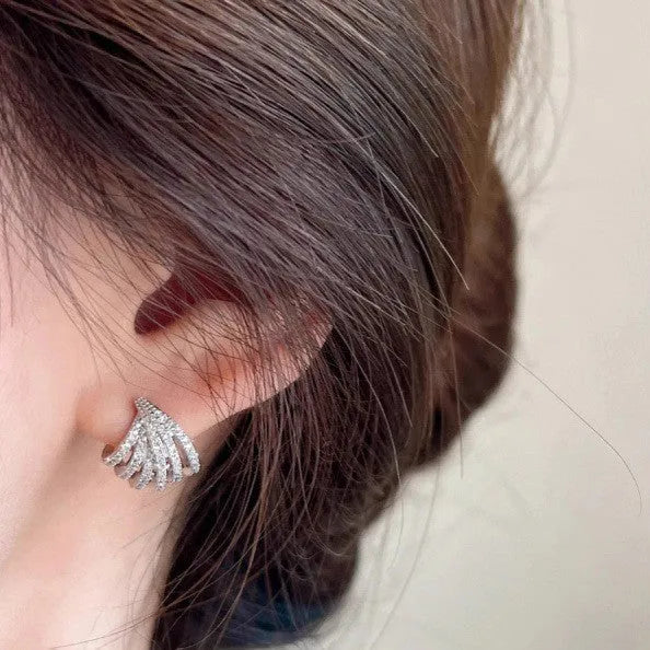 Geometric zircon earrings for women with a platinum electroplated finish.