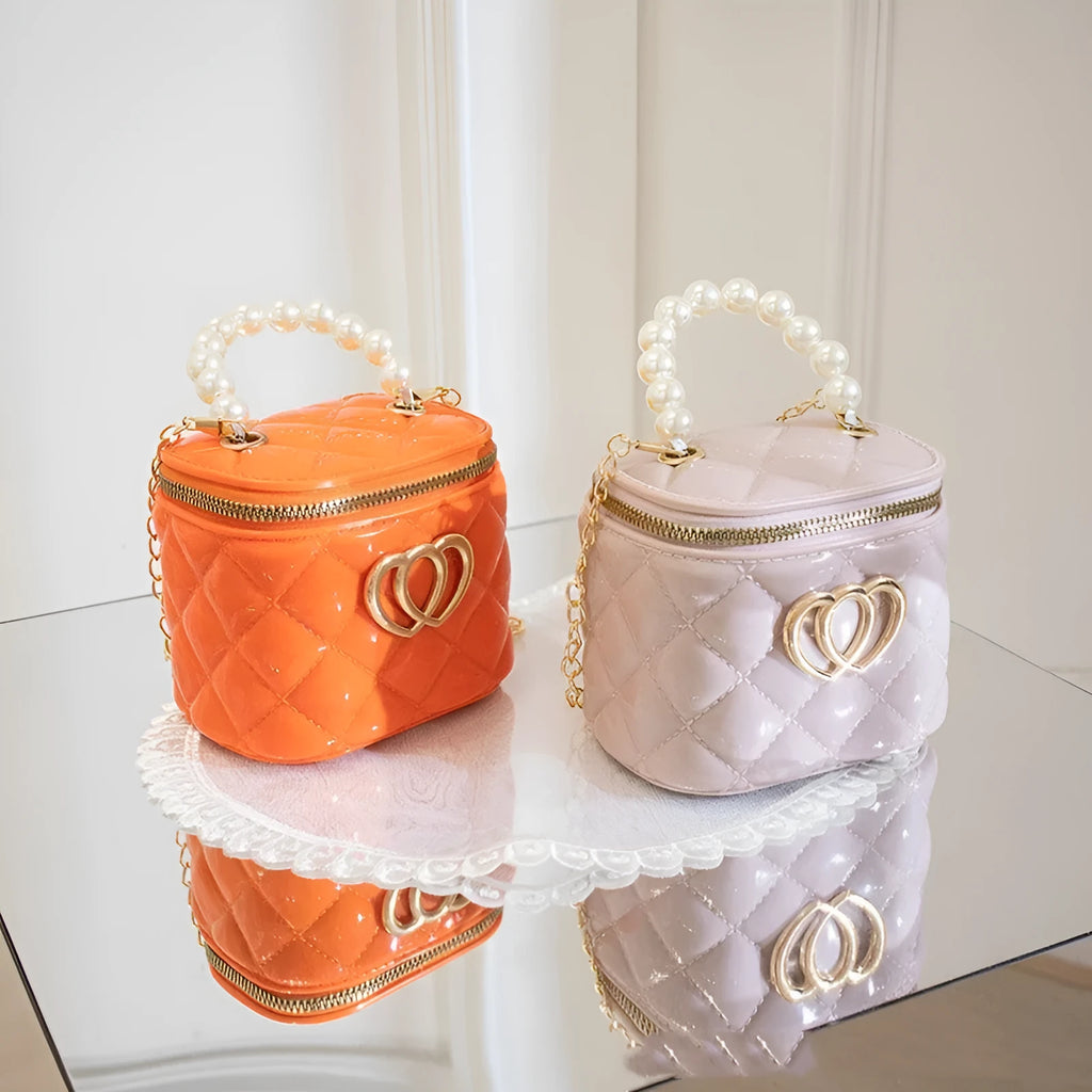 Women's heart-patterned PVC bucket gel bag in apricot colour with bucket shape