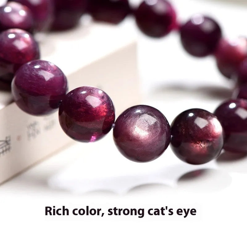 Natural purple lepidolite crystal bracelet with polished round beads, showing different size options.