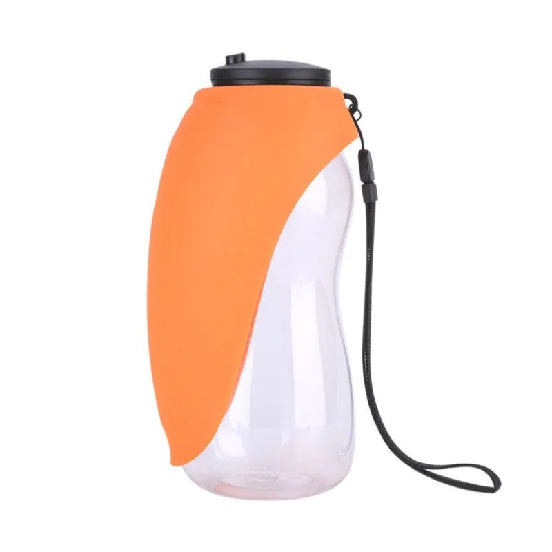 Blue portable pet water bottle with integrated drinking bowl, showing key lock mechanism.