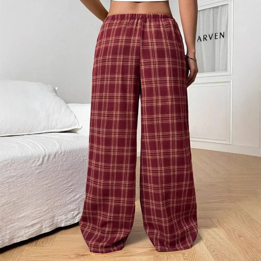 Women's red and blue plaid casual trousers with a drawstring waist and side pockets.