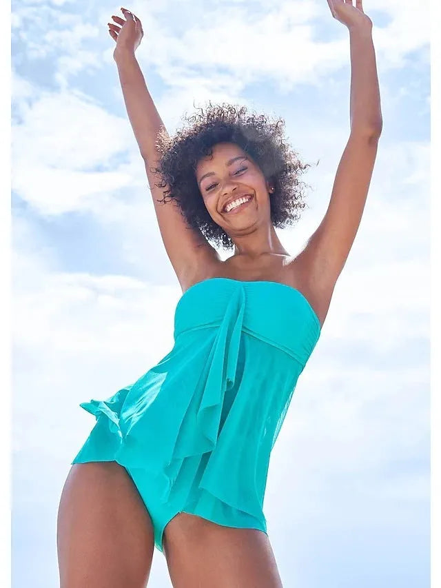 Women's solid colour strapless one-piece swimsuit on a hanger