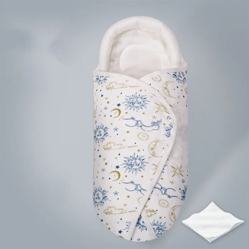 Cotton baby anti startle swaddle measuring 30 by 60 centimetres in a colourful print design.