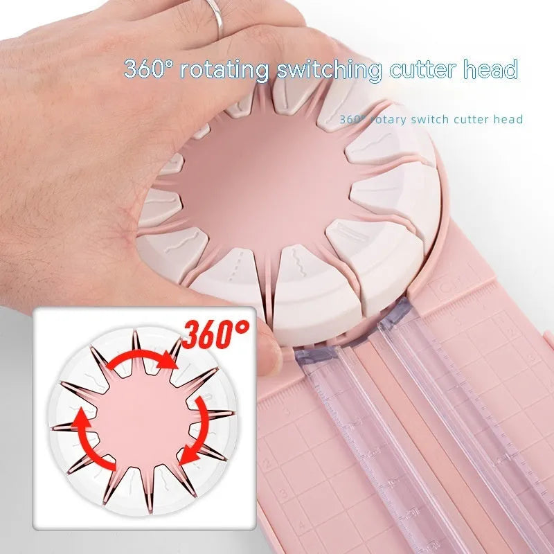 Pink plastic 12-in-1 paper cutting machine with dotted line and other pattern guides on a flat surface.