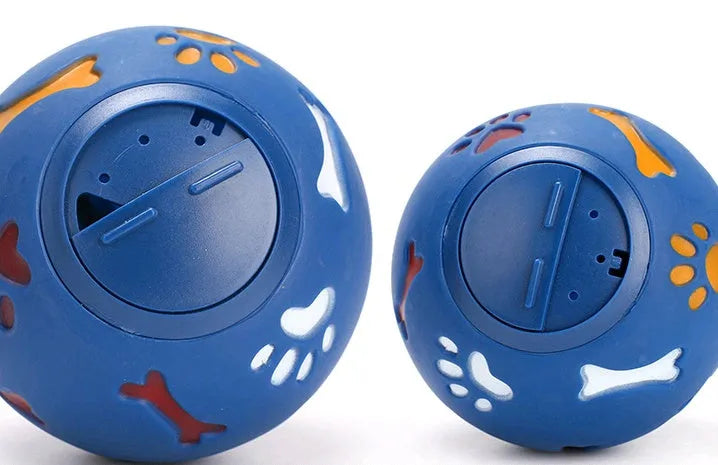 Pet puzzle ball for dogs with skeleton and footprint patterns, blue or red, 7.5cm and 11cm sizes
