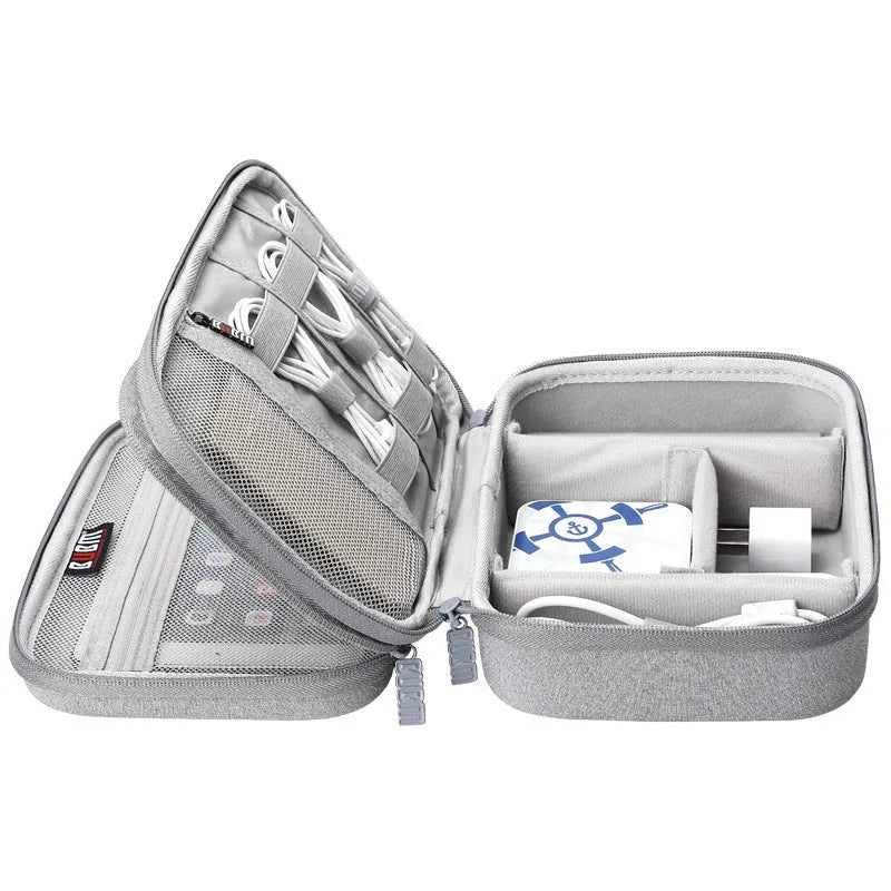 Black and grey EVA digital storage bag with hand bag shape for organising headphones and cables.
