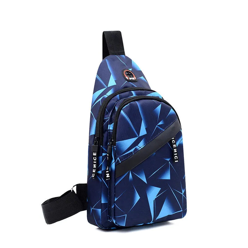 Blue men's crossbody sling bag with earphone hole, made from Oxford cloth, showing front zipper and strap.