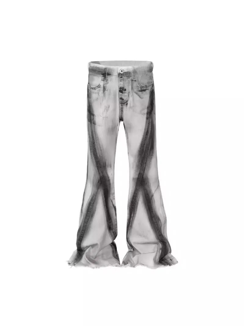 White retro-style selvedge denim jeans with a black ribbon gradient detail on the leg.