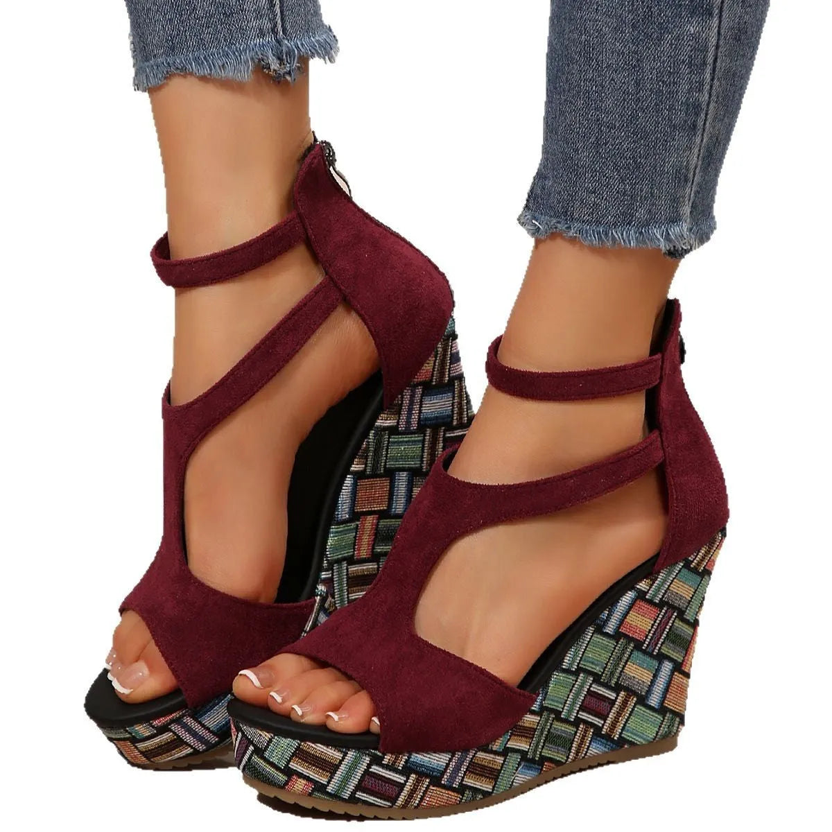 Women's beige ankle-strap sandals with a buckle and thick, textured rubber soles on a plain background.