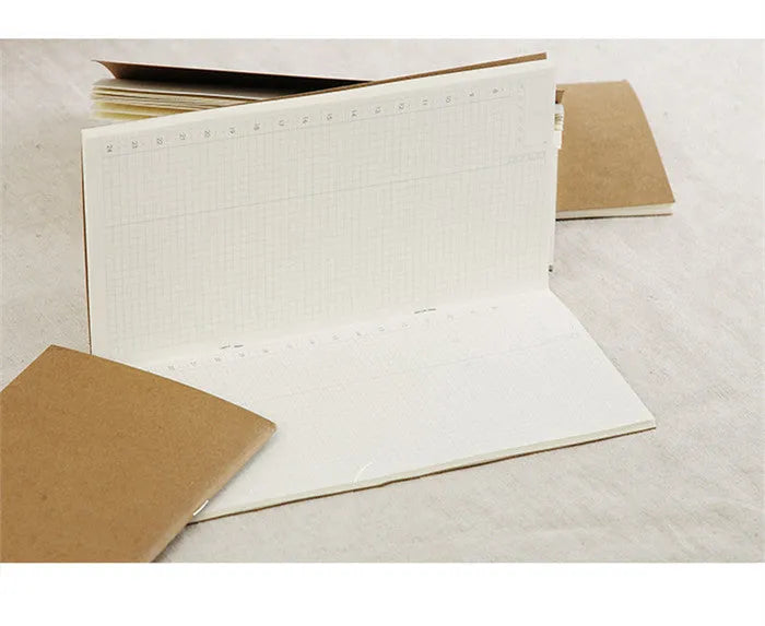 Cowhide diary refill insert showing dot grid and ruled pages with 11x21cm dimensions