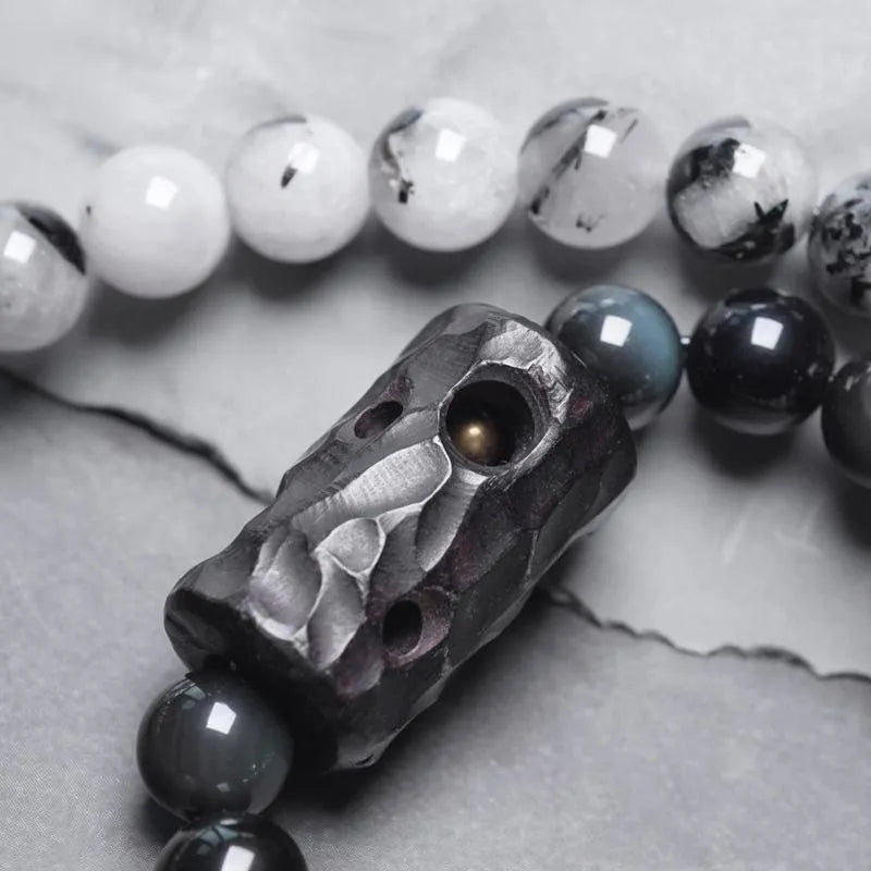 Men's black hair crystal bracelet with white crystal tassel in ethnic design with bending and lacing elements