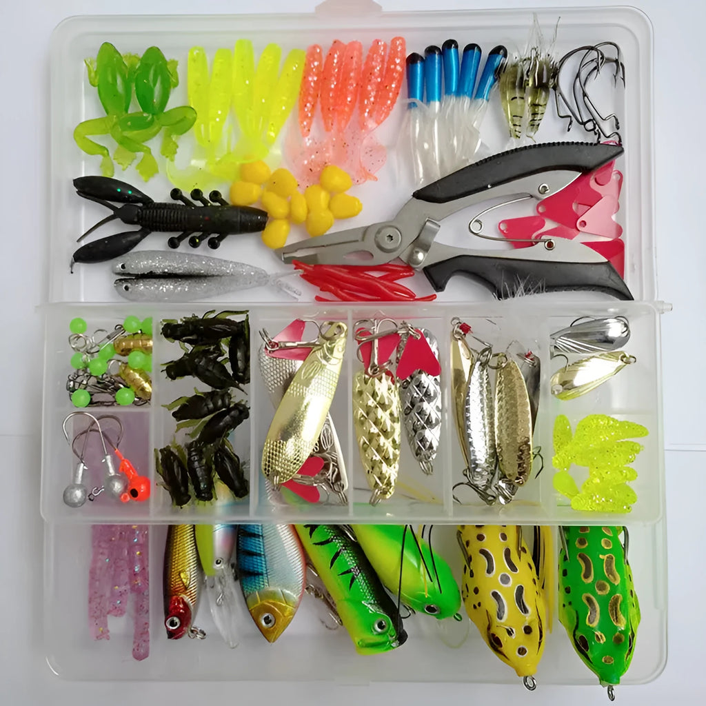 142-piece fishing lure suit with hard minnow baits, sequin spinners, and metal fishing pliers laid out on a table.