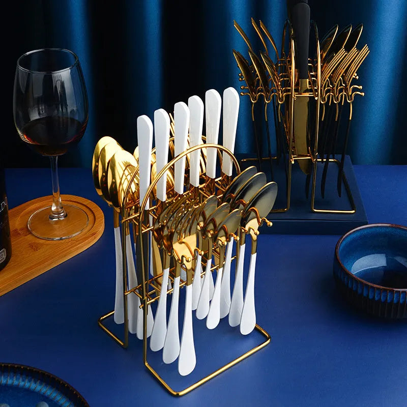 24-piece gold stainless steel cutlery set with knives, forks, spoons and storage rack