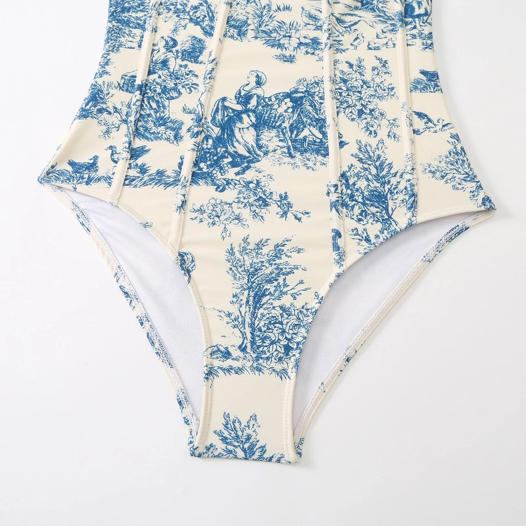Women's blue patterned one-piece swimsuit with matching gauze skirt swimwear set
