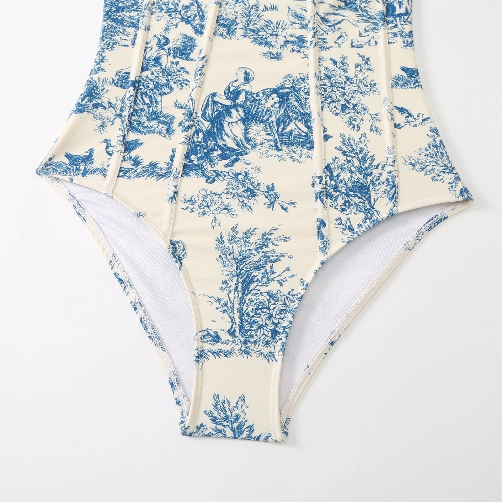 Women's blue patterned one-piece swimsuit with matching gauze skirt swimwear set