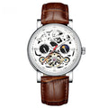 Men's black dial tourbillon mechanical watch with luminous hands on a leather strap.