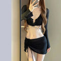 Women's long sleeve black bikini swimsuit with hot spring split style, made from polyester.