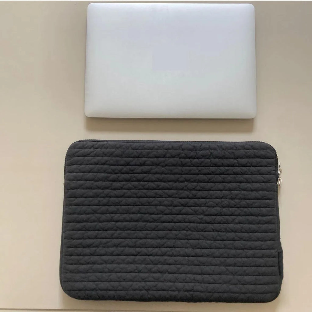 Black and white hand-held anti-seismic laptop bag for tablet protection