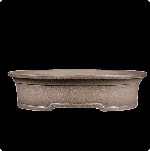 Handmade oval purple sand ceramic bonsai flower pot measuring 25 by 21 by 6.3 centimetres.