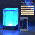 Mini crystal lamp with USB cable and touch control, plastic body, 80x80x12mm size on a desk