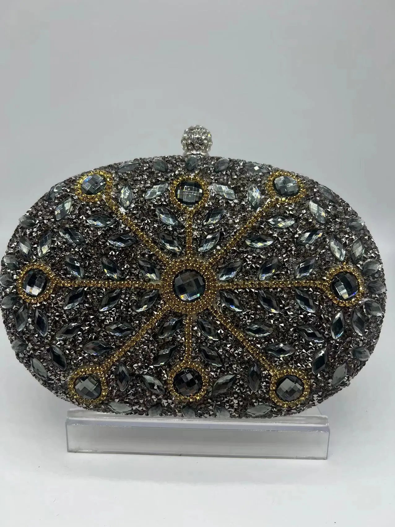 Gold hardware and rhinestone banquet handbag with structured retro design measuring 20cm wide