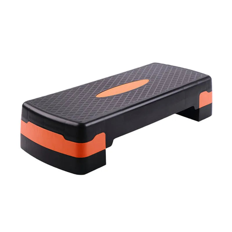 Fit step aerobics platform in grey, green, or orange, measuring 68 cm long by 28 cm wide and 15 cm high.