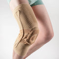 Black and blue basketball knee pads made from nylon and spandex for adult sports protection