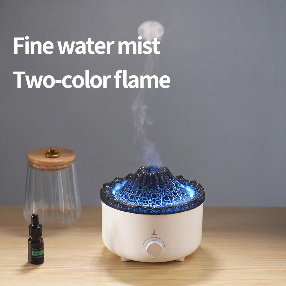 White simulated flame volcano humidifier and aroma diffuser with remote control on wooden surface