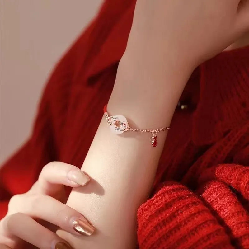 Japanese festive koi fish bracelet with red rope and peace buckle clasp