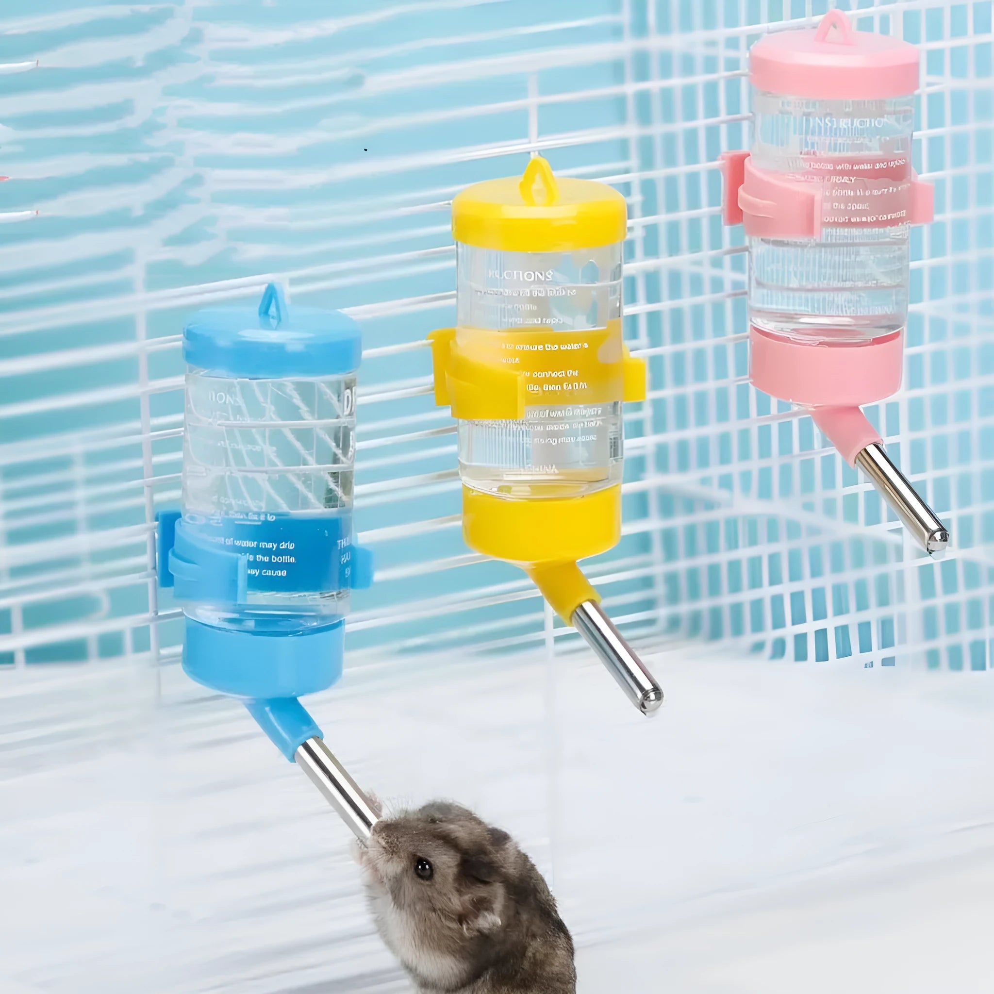 Green plastic ball kettle water feeder for small pets with a leak-proof drinking tube.
