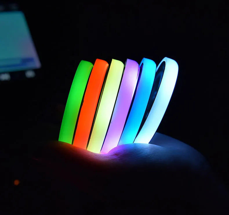 Colourful LED light-up car cup holder coaster showing seven colours, USB cable, and 68mm diameter non-slip surface.