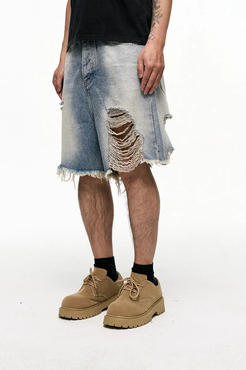 Men's light blue baggy denim shorts with retro washed finish and wide leg design