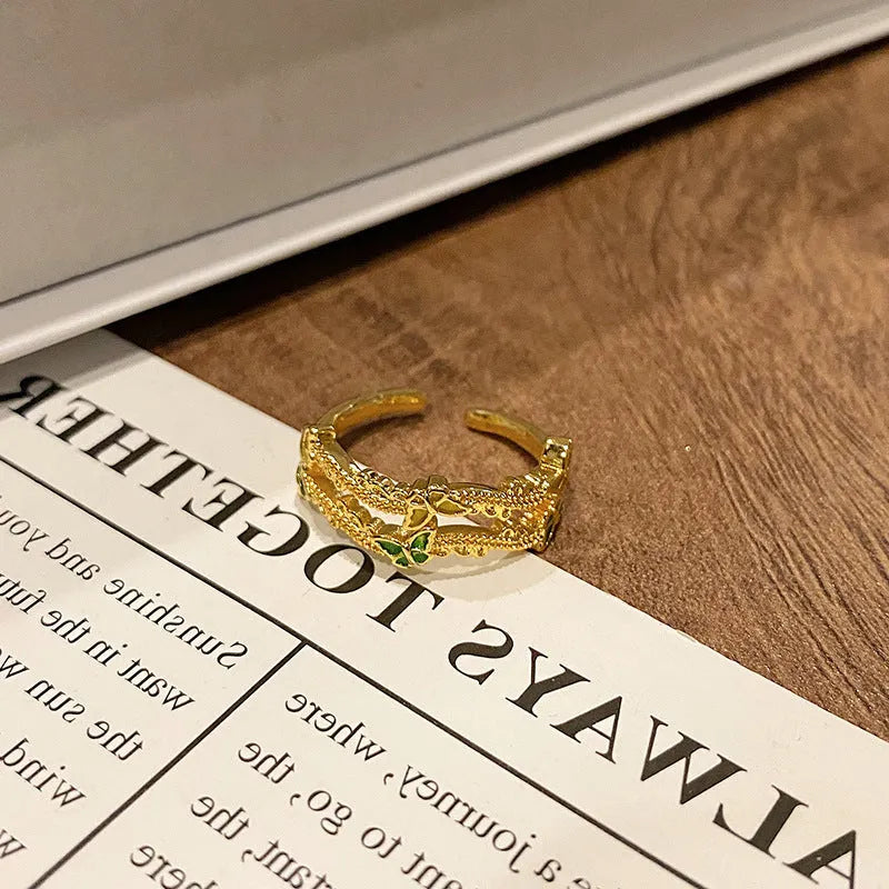 Copper women's ring with Chinese butterfly design and oil-drip finish in simple jewellery style
