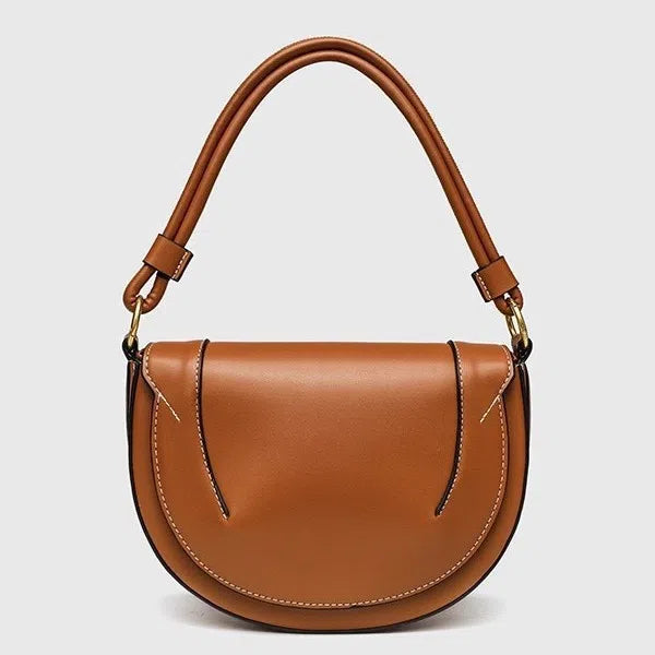 Medium PU saddle bag with magnetic clasp in black oval shape 16x24x8.5cm women's handbag