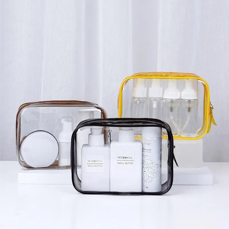 PVC transparent makeup bag in semi-transparent black, pink and white colours with zip closure