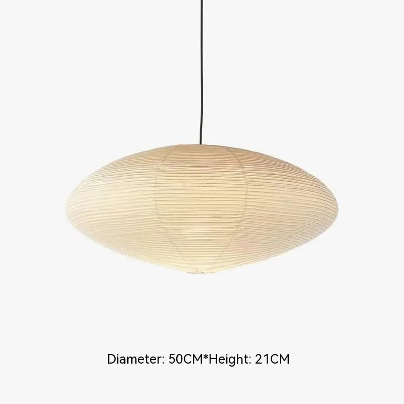 Modern simplicity paper pendant lamp with a round paper shade, shown in a dining room setting.