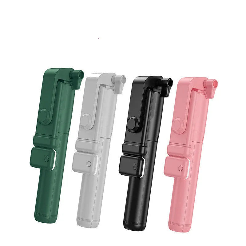 Black Bluetooth selfie stick with extended tripod legs and integrated fill light, holding a smartphone.