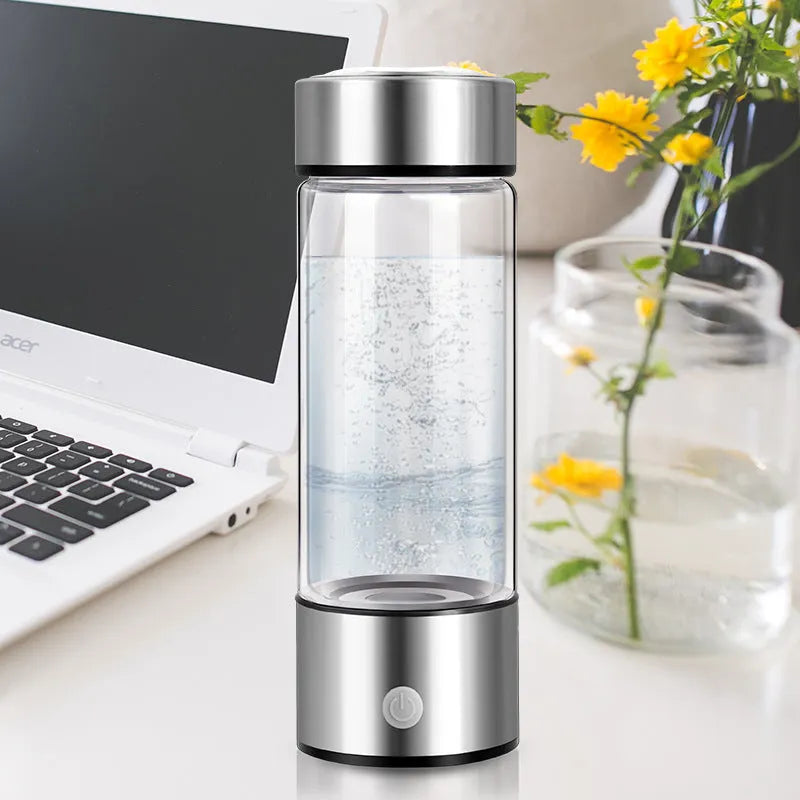 Silver hydrogen water generator bottle with borosilicate glass construction and rechargeable technology