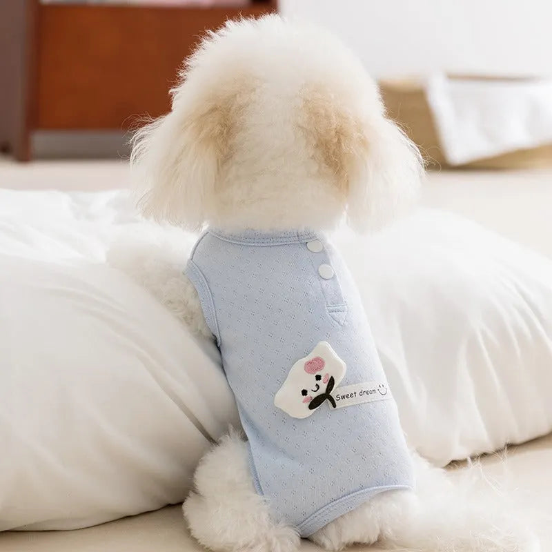 Pet shirt in soft yellow mesh fabric with cat patches and button closure on white background