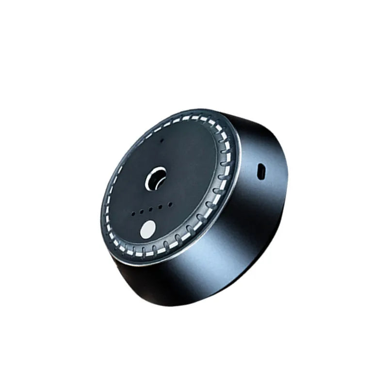 Black metal USB rechargeable car aroma diffuser showing compact size and design
