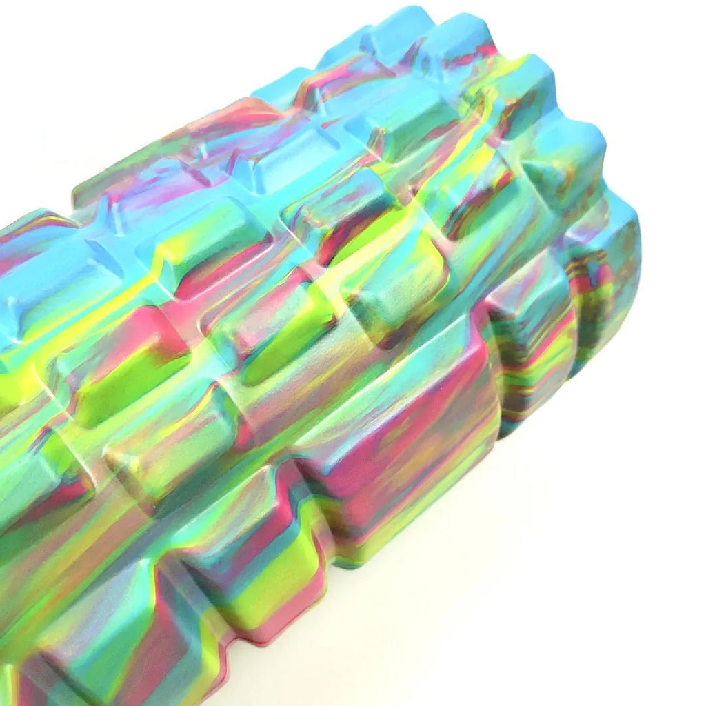 33cm camouflage pattern EVA foam roller in blue green yellow colour on a fitness mat.
