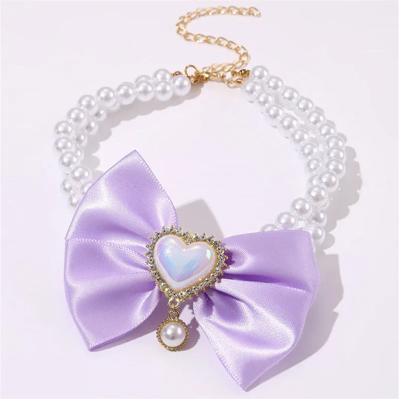 Cute heart shape princess style pet necklace with pearl accents on a cat