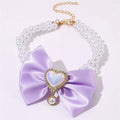 Cute heart shape princess style pet necklace with pearl accents on a cat