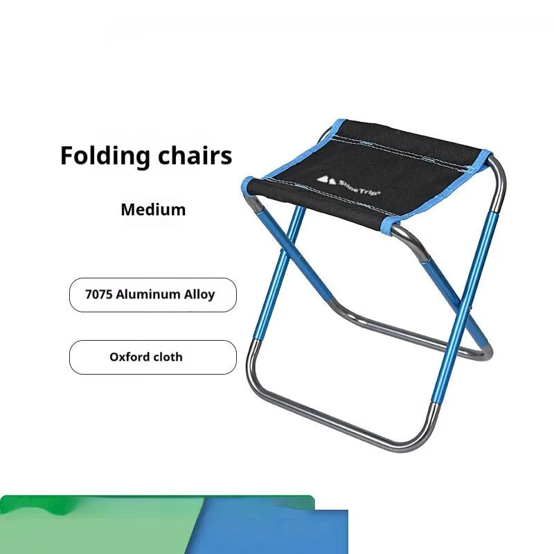 Black aluminium alloy folding camp stool shown in open and folded positions.
