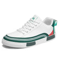 Men's beige, white and green canvas casual shoes with mesh panels and flat heel.