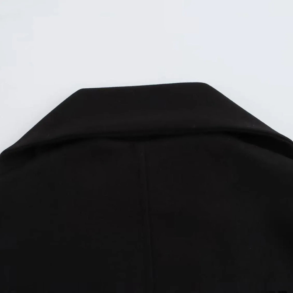 Women's longline polyester coat with an artificial fur collar in a street fashion style.